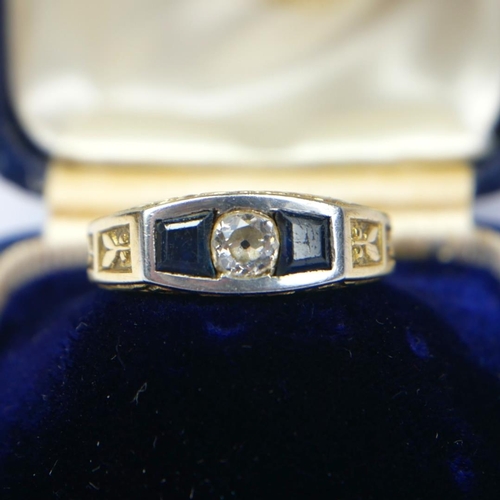 88 - A VINTAGE YELLOW METAL DIAMOND AND SAPPHIRE GENT’S SIGNET RING
The single round cut diamond flanked ... 