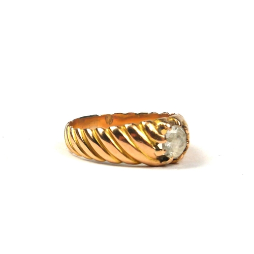 89 - A VINTAGE YELLOW METAL AND DIAMOND GENTS SIGNET RING
The single round old cut diamond in rope twist ... 