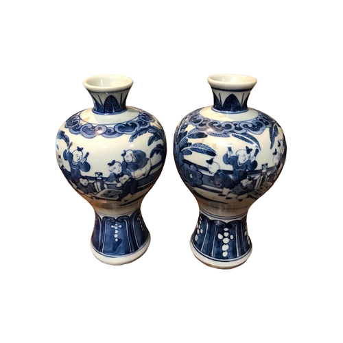 131 - A PAIR OF CHINESE MEIPING BLUE AND WHITE VASES 
Decorated with a partial interior scene showing figu... 