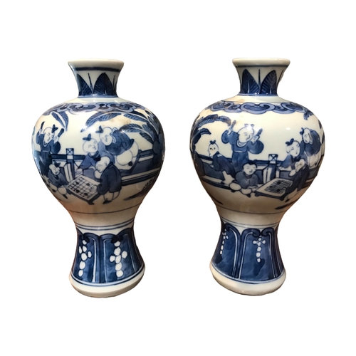 131 - A PAIR OF CHINESE MEIPING BLUE AND WHITE VASES 
Decorated with a partial interior scene showing figu... 