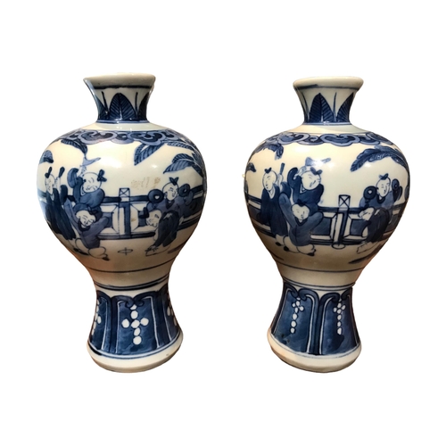 131 - A PAIR OF CHINESE MEIPING BLUE AND WHITE VASES 
Decorated with a partial interior scene showing figu... 