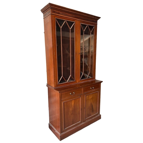 212 - MAPLE & CO., A LATE 19TH CENTURY INLAID MAHOGANY BOOKCASE
With glazed doors opening to reveal adjust... 