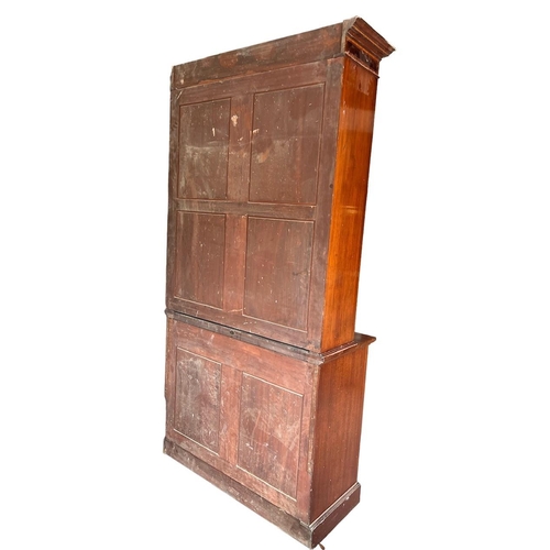 212 - MAPLE & CO., A LATE 19TH CENTURY INLAID MAHOGANY BOOKCASE
With glazed doors opening to reveal adjust... 