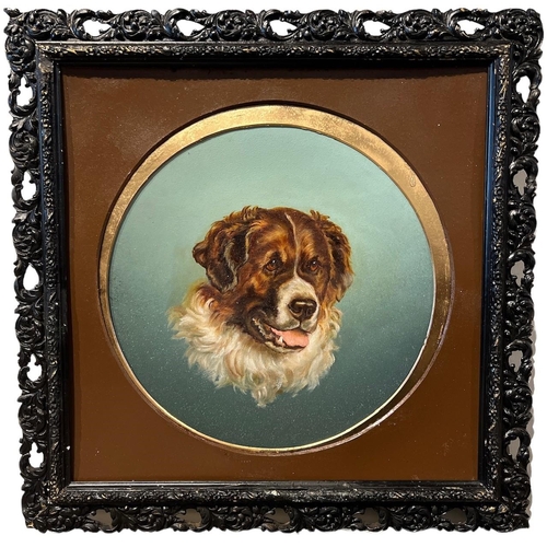 303 - A LATE 19TH/EARLY 20TH CENTURY CIRCULAR OIL ON METAL, PORTRAIT OF A SAINT BERNARD
Held in a painted ... 