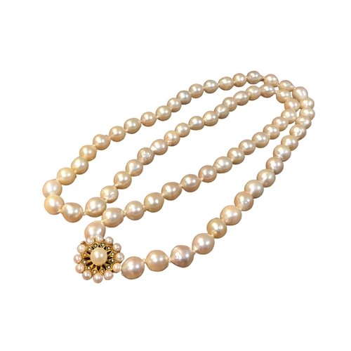 76A - A PEAR SHAPED SEA PEARL NECKLACE
With 9ct gold clasp, inset with a central round pearl with seed pea... 