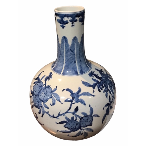 201 - A 19TH CENTURY CHINESE BLUE AND WHITE TIANQIUPING GLOBULAR VASE
Decorated with branches bearing frui... 