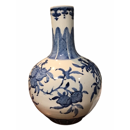 201 - A 19TH CENTURY CHINESE BLUE AND WHITE TIANQIUPING GLOBULAR VASE
Decorated with branches bearing frui... 