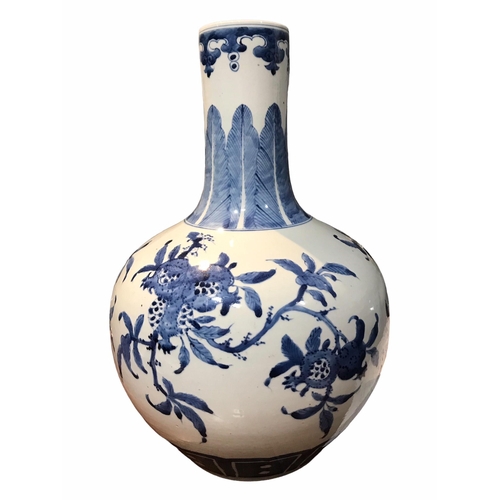 201 - A 19TH CENTURY CHINESE BLUE AND WHITE TIANQIUPING GLOBULAR VASE
Decorated with branches bearing frui... 