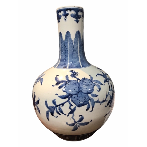 201 - A 19TH CENTURY CHINESE BLUE AND WHITE TIANQIUPING GLOBULAR VASE
Decorated with branches bearing frui... 