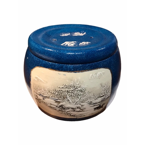 205 - A LATE 19TH/EARLY 20TH CENTURY CHINESE BLUE GLAZED JAR AND LID
Decorated with two snowy figural land... 