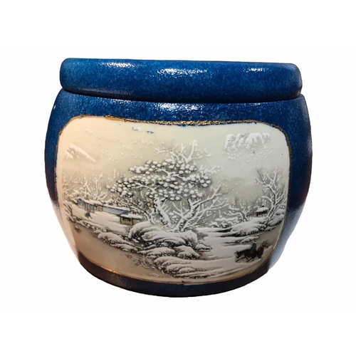 205 - A LATE 19TH/EARLY 20TH CENTURY CHINESE BLUE GLAZED JAR AND LID
Decorated with two snowy figural land... 