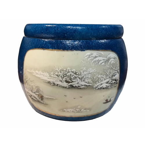 205 - A LATE 19TH/EARLY 20TH CENTURY CHINESE BLUE GLAZED JAR AND LID
Decorated with two snowy figural land... 