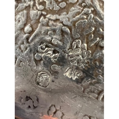 95c - A 20TH CENTURY PERSIAN/IRANIAN SILVER FLORAL PLATE
Finely decorated with central floral motif surrou... 