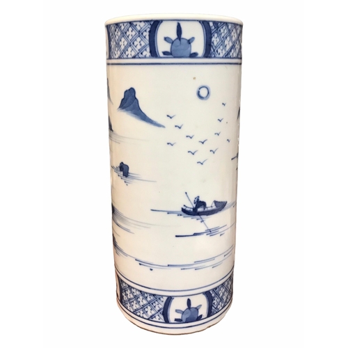83 - A CHINESE BLUE AND WHITE BRUSH POT 
Decorated with a landscape scene with figure in a boat, met by b... 