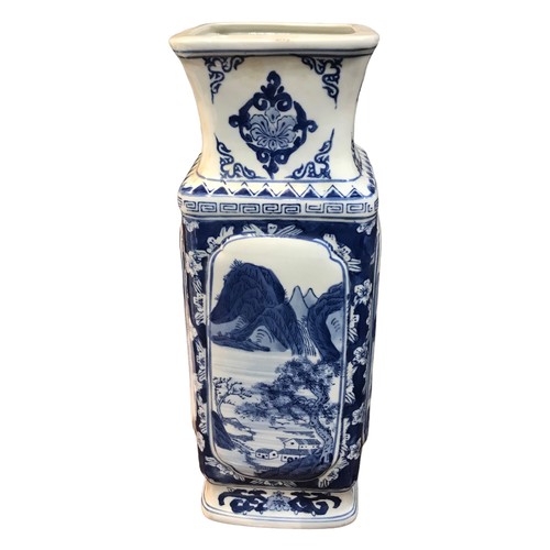 85 - A LARGE PAIR OF JAPANESE BLUE AND WHITE RECTANGULAR VASES
Decorated with a mountainous landscape sce... 