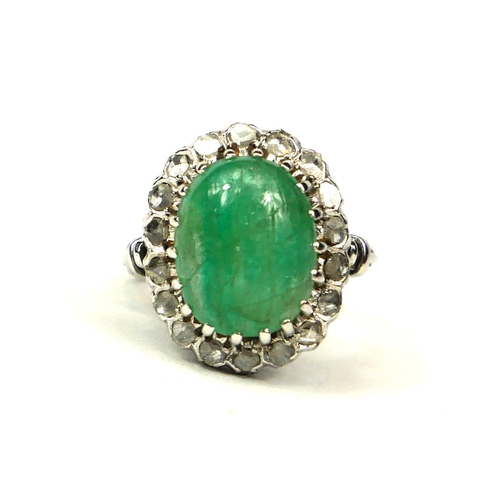 1A - WHITE METAL, LARGE OVAL CABOCHON EMERALD AND ROSE CUT DIAMONDS RING.  Emerald 4.00ct approx.  Diamon... 