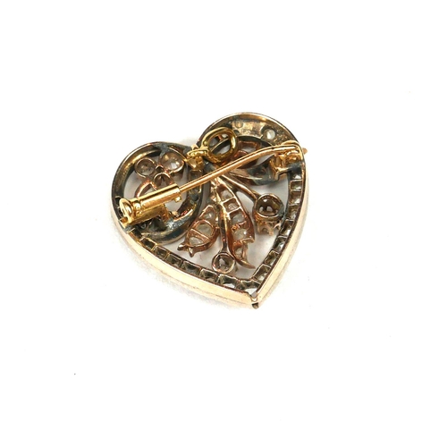 27 - AN EDWARDIAN WHITE METAL AND DIAMOND HEART SHAPED BROOCH/PENDANT
Reverse with yellow metal pin and b... 