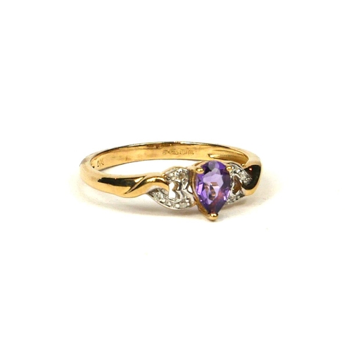 32 - A 9CT YELLOW GOLD, PEAR SHAPED AMETHYST RING WITH HEART DIAMOND SET SHOULDERS