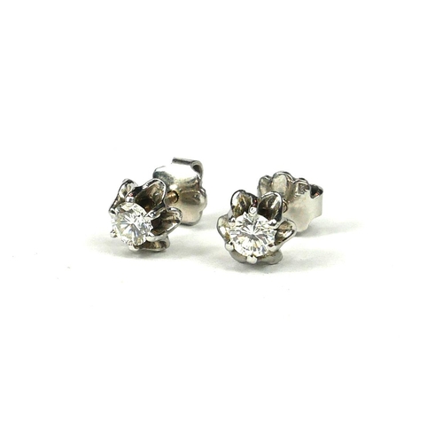 33 - A PAIR OF WHITE METAL AND DIAMOND SOLITAIRE EARRINGS
Screw back posts.
(tested for 14ct, diamond dia... 