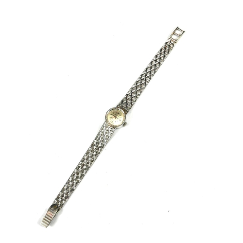 5 - DELMONT, SWITZERLAND, AN 18CT WHITE GOLD LADIES WRISTWATCH
On a textured strap.
(26.5g)