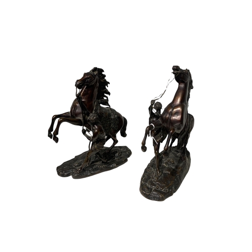 91 - AFTER COUSTOU, GUILLAUME, 1677 - 1746, A PAIR OF 19TH CENTURY FRENCH PATINATED BRONZE GROUPS OF THE ... 