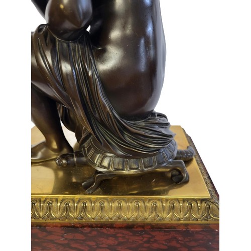 96 - VENUS BATHING, A 19TH CENTURY BRONZE STATUE
On gilded bronze and rouge marble stand.
(36cm, 46cm inc... 