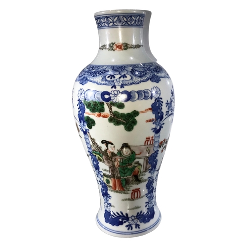 87 - A CHINESE FAMILLE VERTE VASE ON WHITE GROUND 
Figural scenes within blue floral panels, bearing blue... 