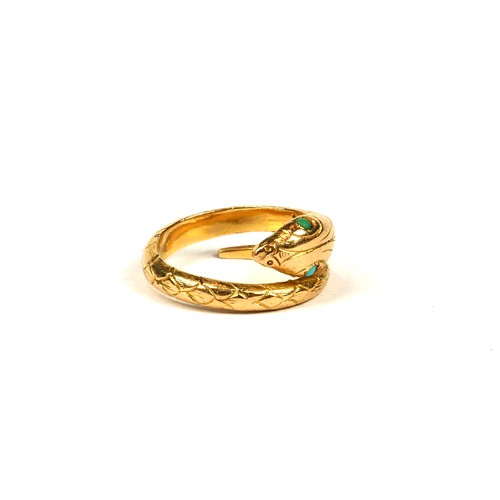 12A - AN EARLY 20TH CENTURY PORTUGUESE 19.2CT GOLD AND TURQUOISE SNAKE BYPASS RING.
(UK ring size L, gross... 