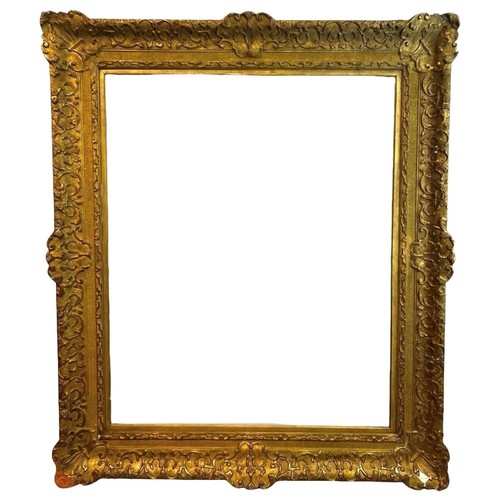 244 - A LARGE LATE 18TH/EARLY 19TH CENTURY ENGLISH GILTWOOD AND GESSO FRAME
Decorated with shells scrollin... 