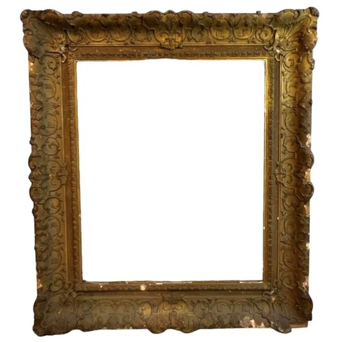 243 - A LARGE LATE 18TH/EARLY 19TH CENTURY ENGLISH GILTWOOD AND GESSO FRAME
Decorated with scrolling folia... 