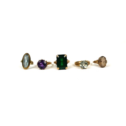 33A - A COLLECTION OF 20TH CENTURY 9CT GOLD SOLITAIRE RINGS 
To include an amethyst ring, hallmarked Londo... 