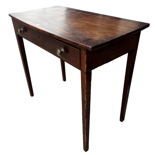 161A - A GEORGE III MAHOGANY AND LINE INLAID BOW FRONTED SIDE TABLE
With single drawer, raised on square ta... 