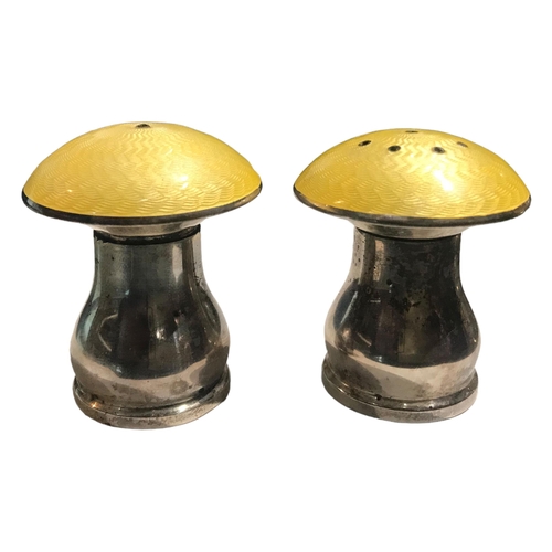 48A - ATTRIBUTED EGON LAURIDSEN, DENMARK, A PAIR OF SILVER AND ENAMEL STYLISED MUSHROOM SALT AND PEPPER SH... 