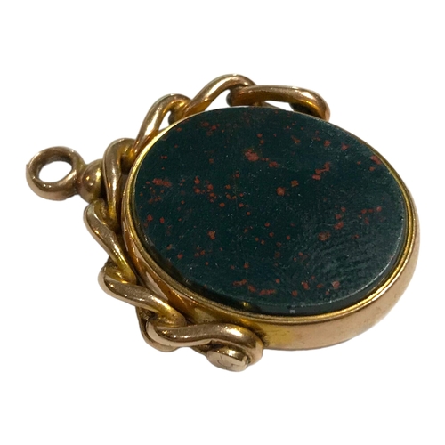 60A - A LARGE VICTORIAN 9CT GOLD, BLOODSTONE AND CARNELIAN SWIVEL FOB, HALLMARKED, 1884
Having stylised cu... 