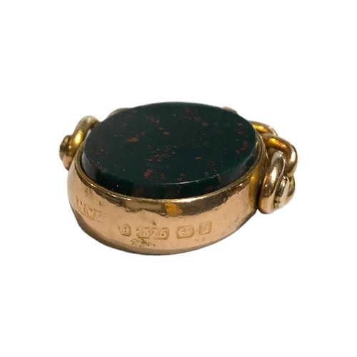 60A - A LARGE VICTORIAN 9CT GOLD, BLOODSTONE AND CARNELIAN SWIVEL FOB, HALLMARKED, 1884
Having stylised cu... 