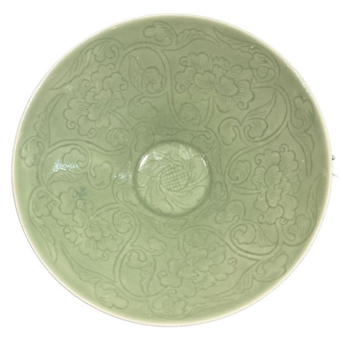 87A - A 19TH CENTURY CHINESE CELADON FOOTED BOWL
With incised floral underglaze decoration.
(h 8.4cm x dia... 