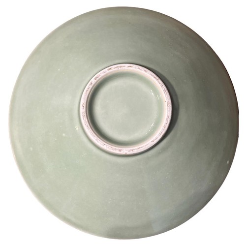 87A - A 19TH CENTURY CHINESE CELADON FOOTED BOWL
With incised floral underglaze decoration.
(h 8.4cm x dia... 