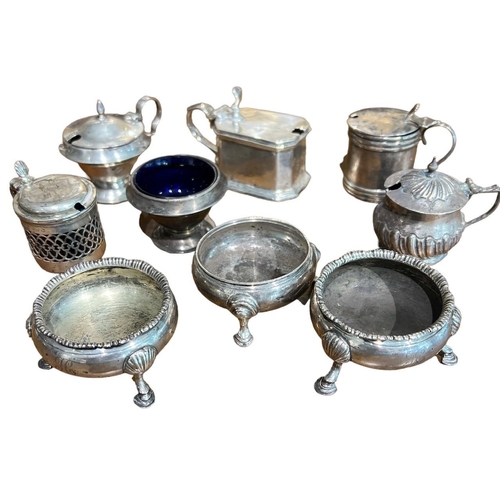 66A - A COLLECTION OF NINE 18TH CENTURY AND LATER SILVER SALTS 
Hallmarked Samuel Meriton II, London, 1769... 