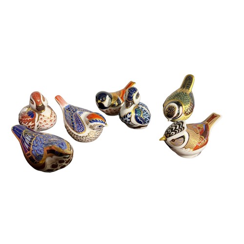 107 - ROYAL CROWN DERBY, A SELECTION OF SEVEN BIRD/DUCKLING FIGURES
To include a gold buttoned crested tit... 