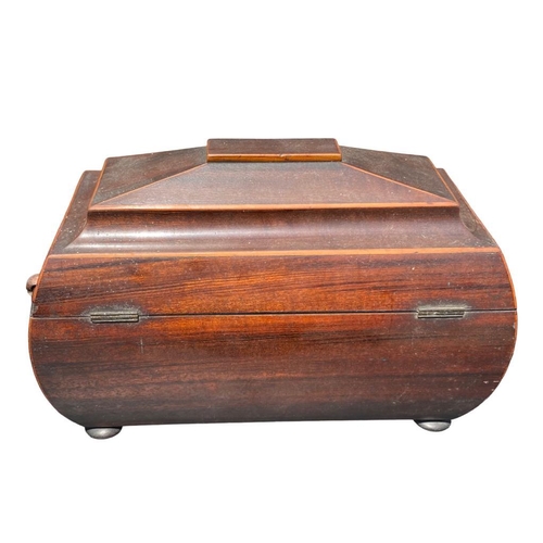 80 - A 19TH CENTURY WOODEN TEA CADDY
Having felt buttoned interior, raised on four bun feet.