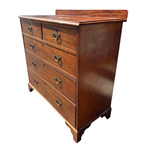 122 - A 19TH CENTURY MAHOGANY CHEST OF TWO SHORT OVER THREE LONG GRADUATED DRAWERS
Raised on bracket feet.... 