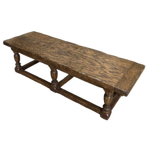 136 - A 17TH CENTURY DESIGN OAK MINIATURE PIECE REFECTORY TABLE
The single plank table raised on si