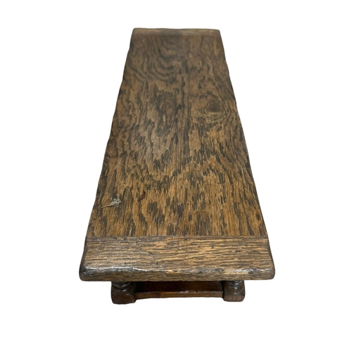 136 - A 17TH CENTURY DESIGN OAK MINIATURE PIECE REFECTORY TABLE
The single plank table raised on si