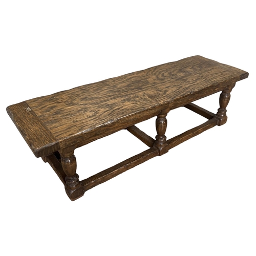 136 - A 17TH CENTURY DESIGN OAK MINIATURE PIECE REFECTORY TABLE
The single plank table raised on si