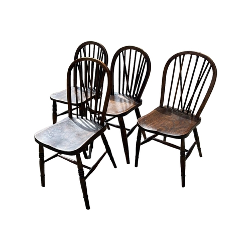 144 - FOUR 19TH CENTURY ELM STICKBACK FARMHOUSE DINING CHAIRS 
The turned spindles above solid shaped seat... 