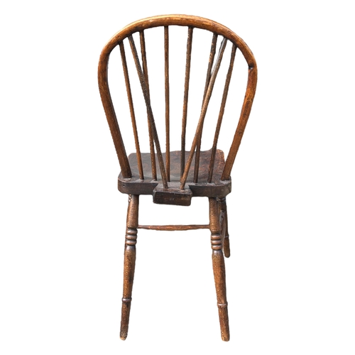 144 - FOUR 19TH CENTURY ELM STICKBACK FARMHOUSE DINING CHAIRS 
The turned spindles above solid shaped seat... 