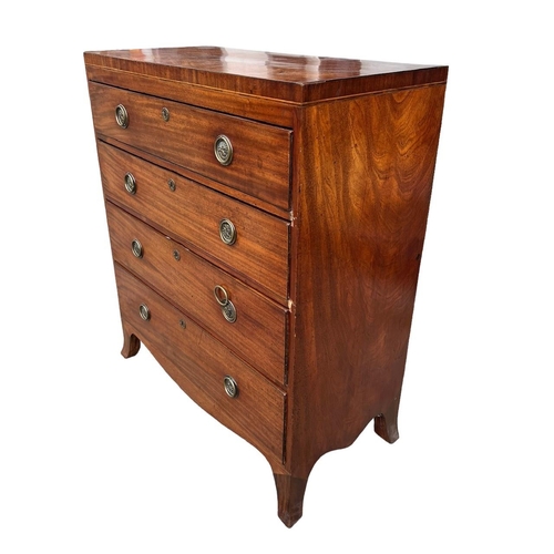 131 - A 19TH CENTURY REGENCY MAHOGANY CHEST OF FOUR LONG GRADUATED DRAWERS
Fitted with brass handles, rais... 