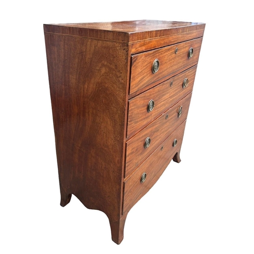 131 - A 19TH CENTURY REGENCY MAHOGANY CHEST OF FOUR LONG GRADUATED DRAWERS
Fitted with brass handles, rais... 