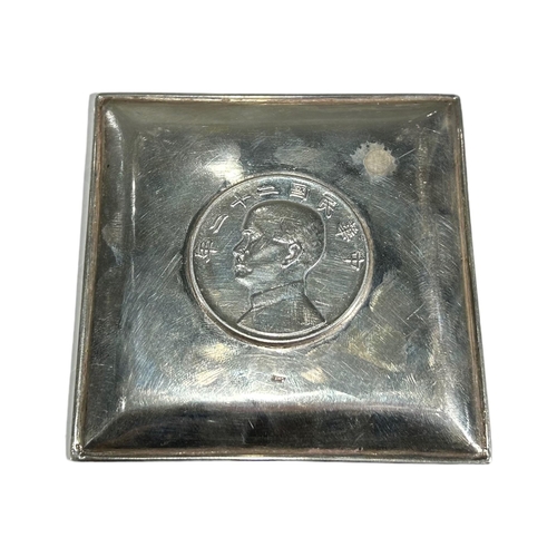 30 - A CHINESE SILVER CIRCULAR ASHTRAY, CIRCA 1910
Together with a 1930’s Chinese silver square ashtray, ... 