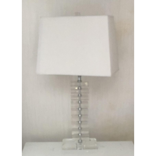 509 - A PAIR OF BLOCK GLASS TABLE LAMPS
With cream shades.
(65cm)

Condition: good